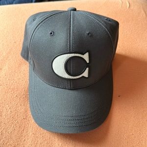 Coach cap leather details